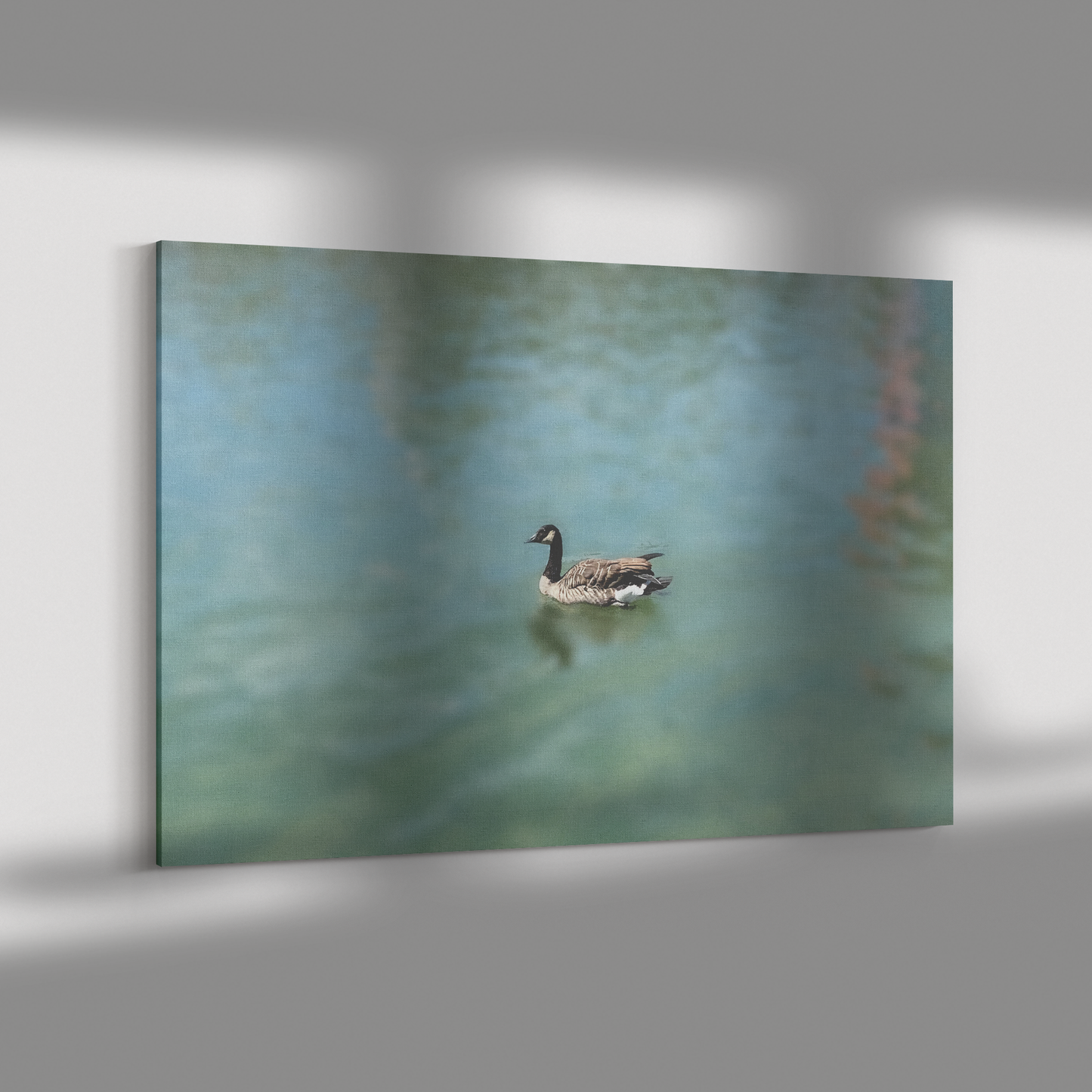 Wrapped_Canvas_Print_Serene_Duck_on_a_P_H_Rectangle_Dramatic_Shadow_Mockup.png